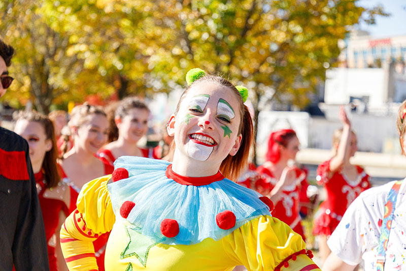 Circus performer at Homecoming parade.